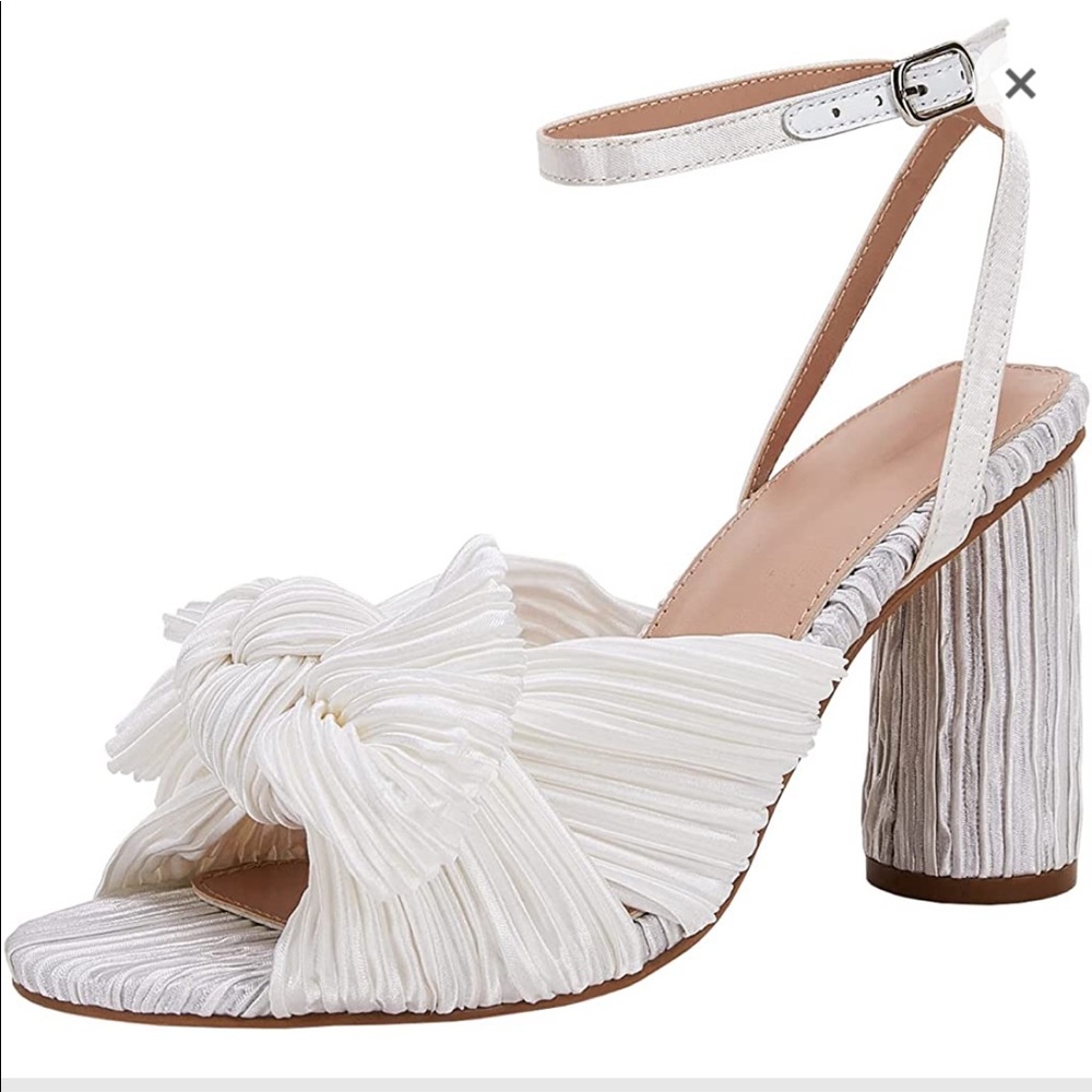 loeffler randall look alike white heels.  Never been worn.